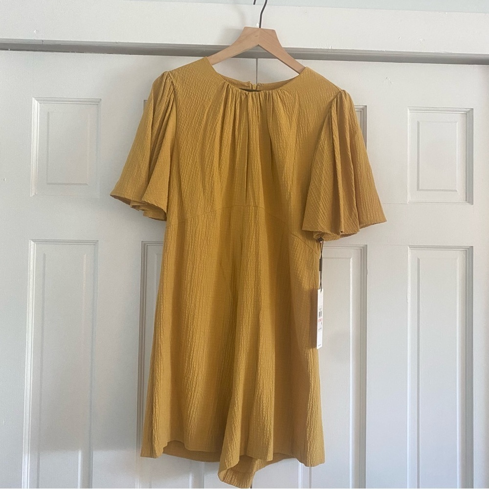 Calvin Klein Mustard new with tags romper with bell sleeves